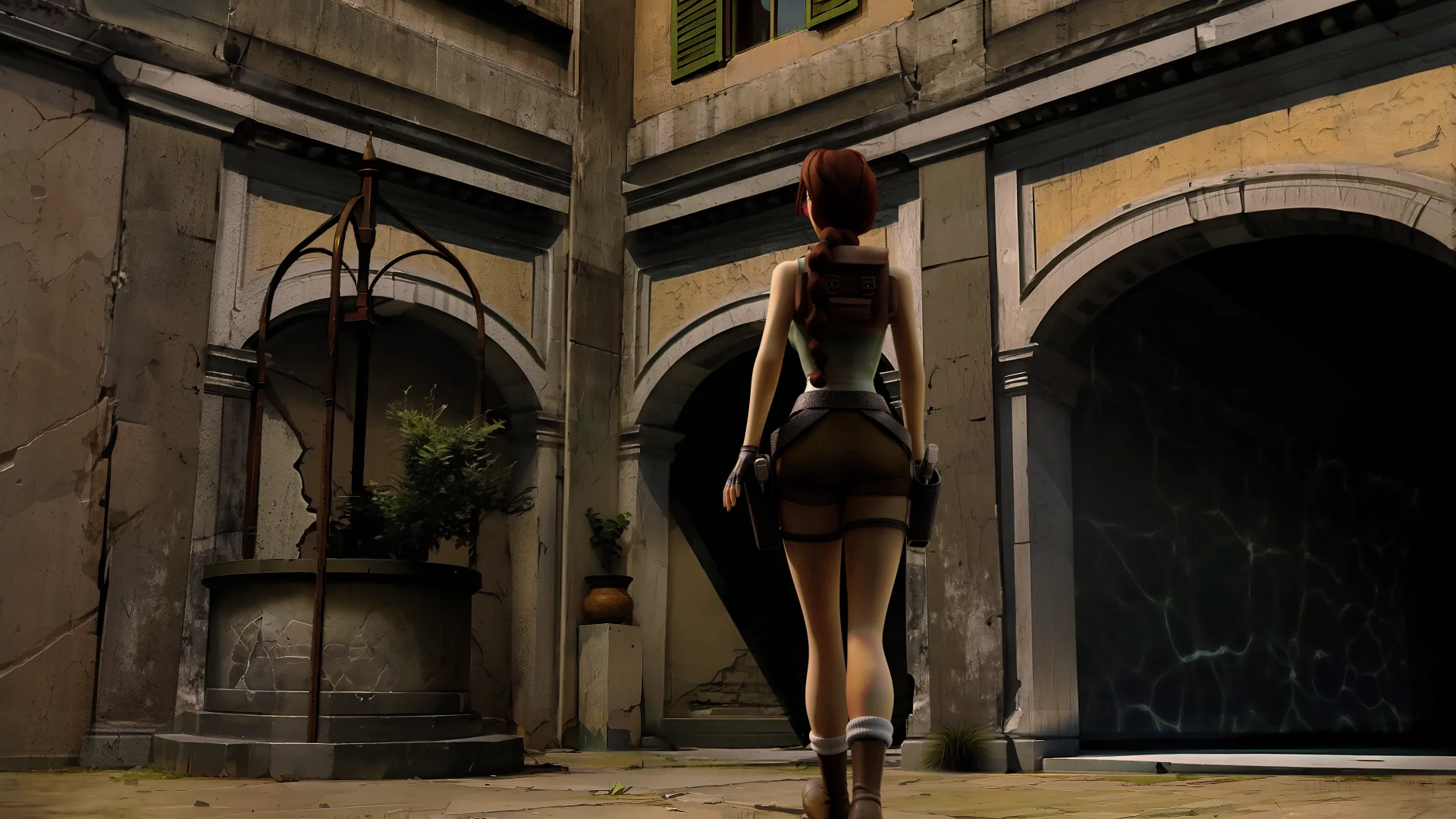 Lara Croft en el patio con pozo veneciano durante la persecución de la Fiamma Nera